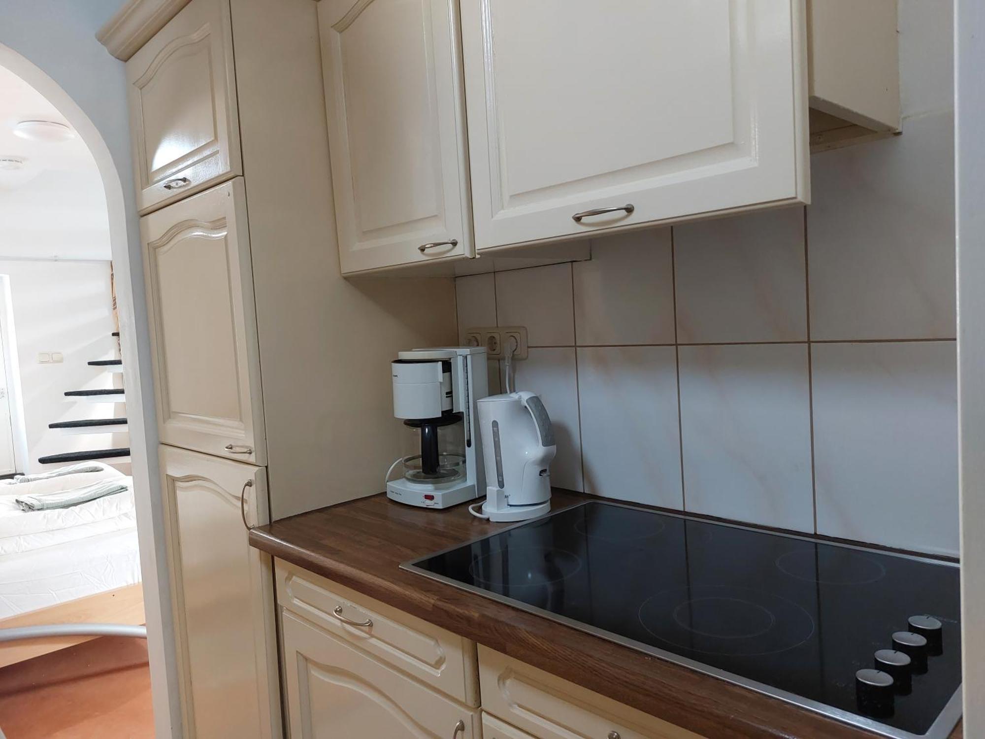 Singelachterhuis Appartement